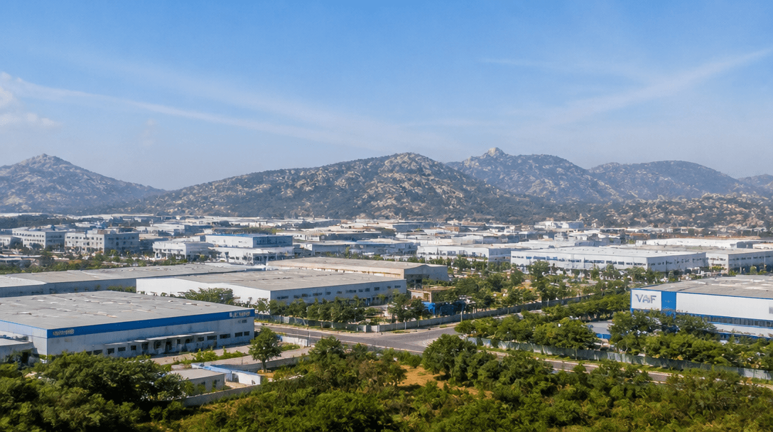 Industrial manufacturing zone in Hosur with factories and green surroundings